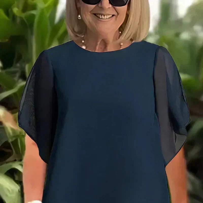 Conjunto de top irregular de doble capa y pantalón de pierna ancha